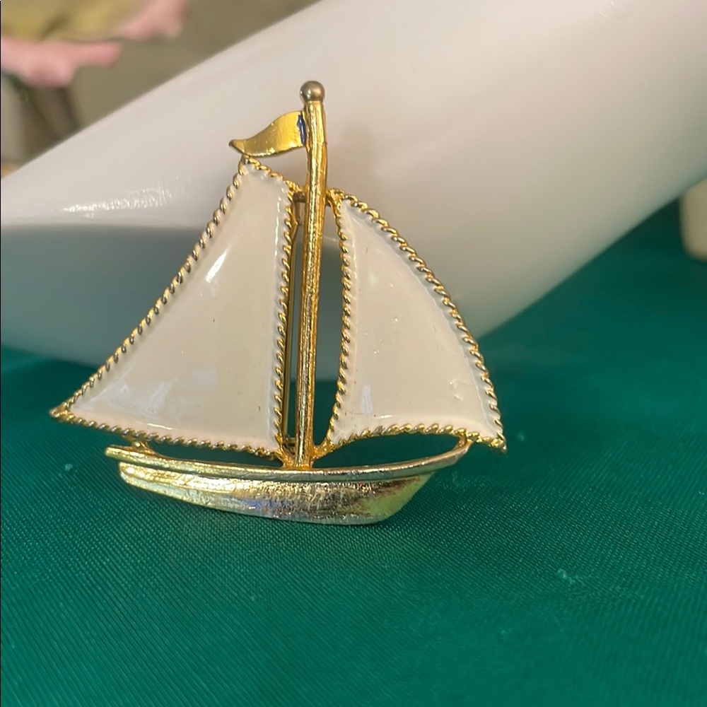 Gold and white tone Sailboat Brooch